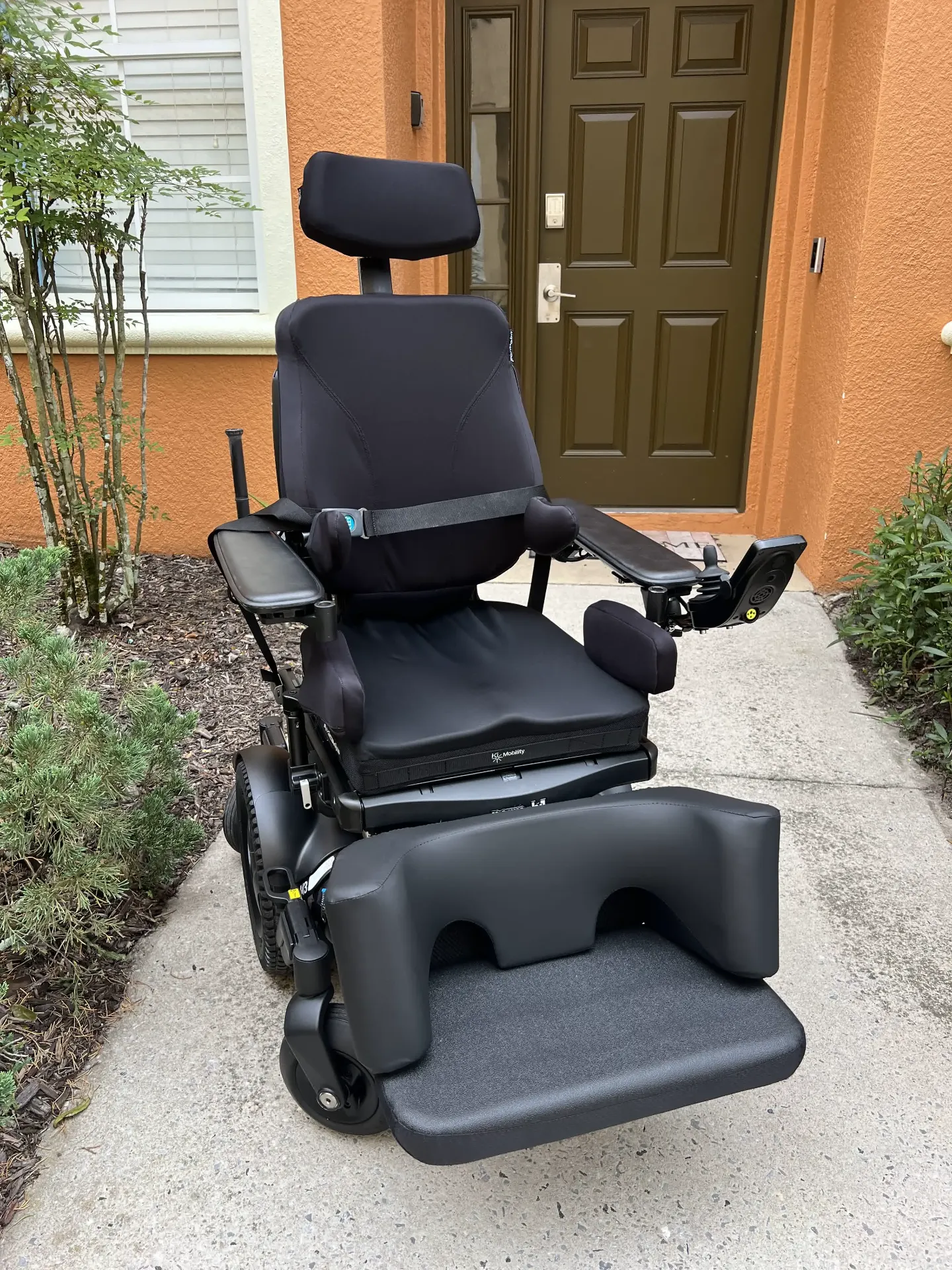 Permobil M3 Corpus power wheelchair front view with footplate and seat