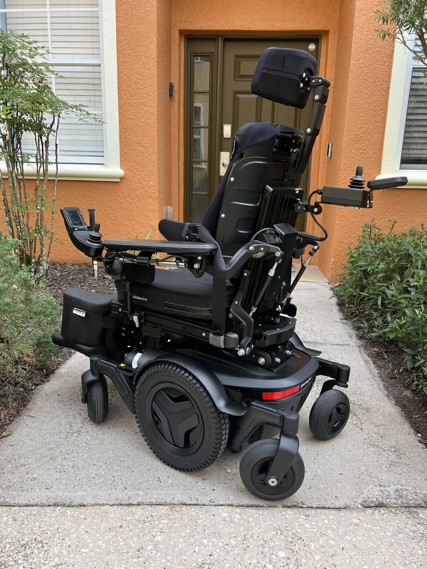 Permobil M3 Corpus power wheelchair, full view from the front