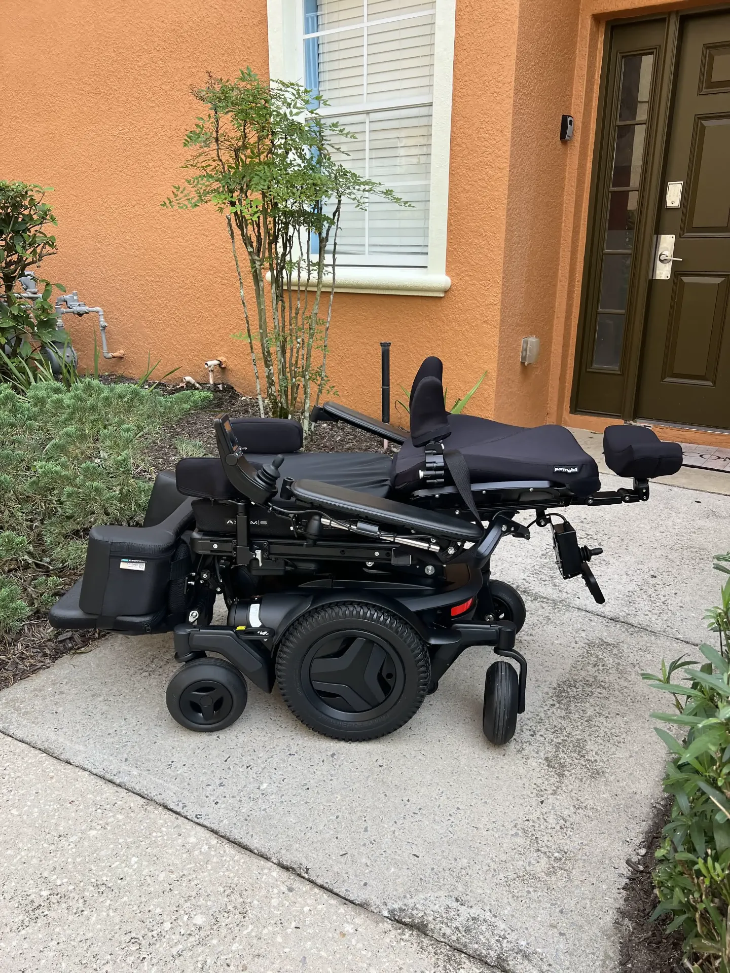 Permobil M3 Corpus power wheelchair in full recline position